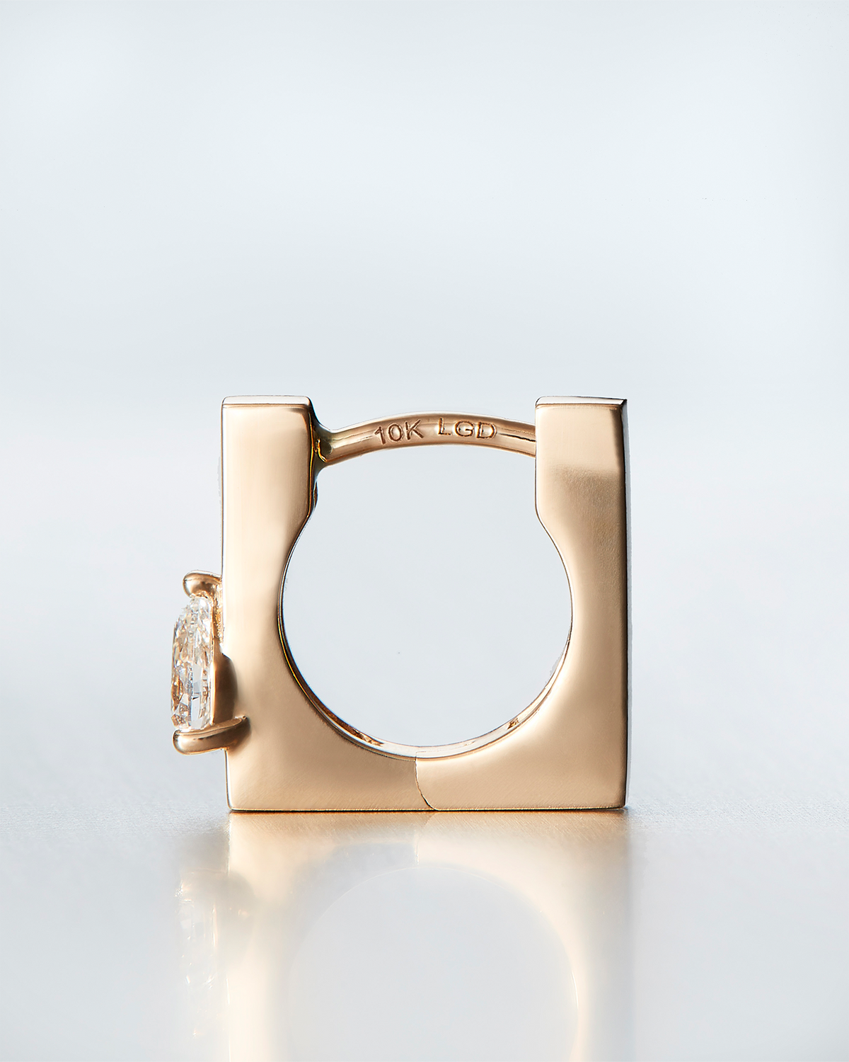 10K Pear Cut Diamond Huggie Earrings