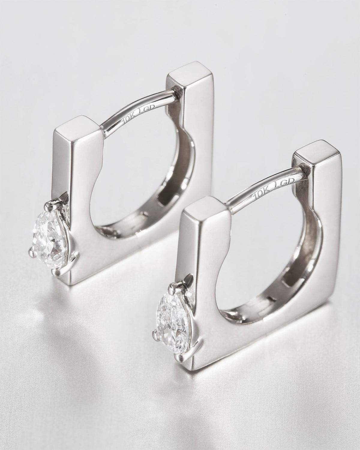 10K Pear Cut Diamond Huggie Earrings