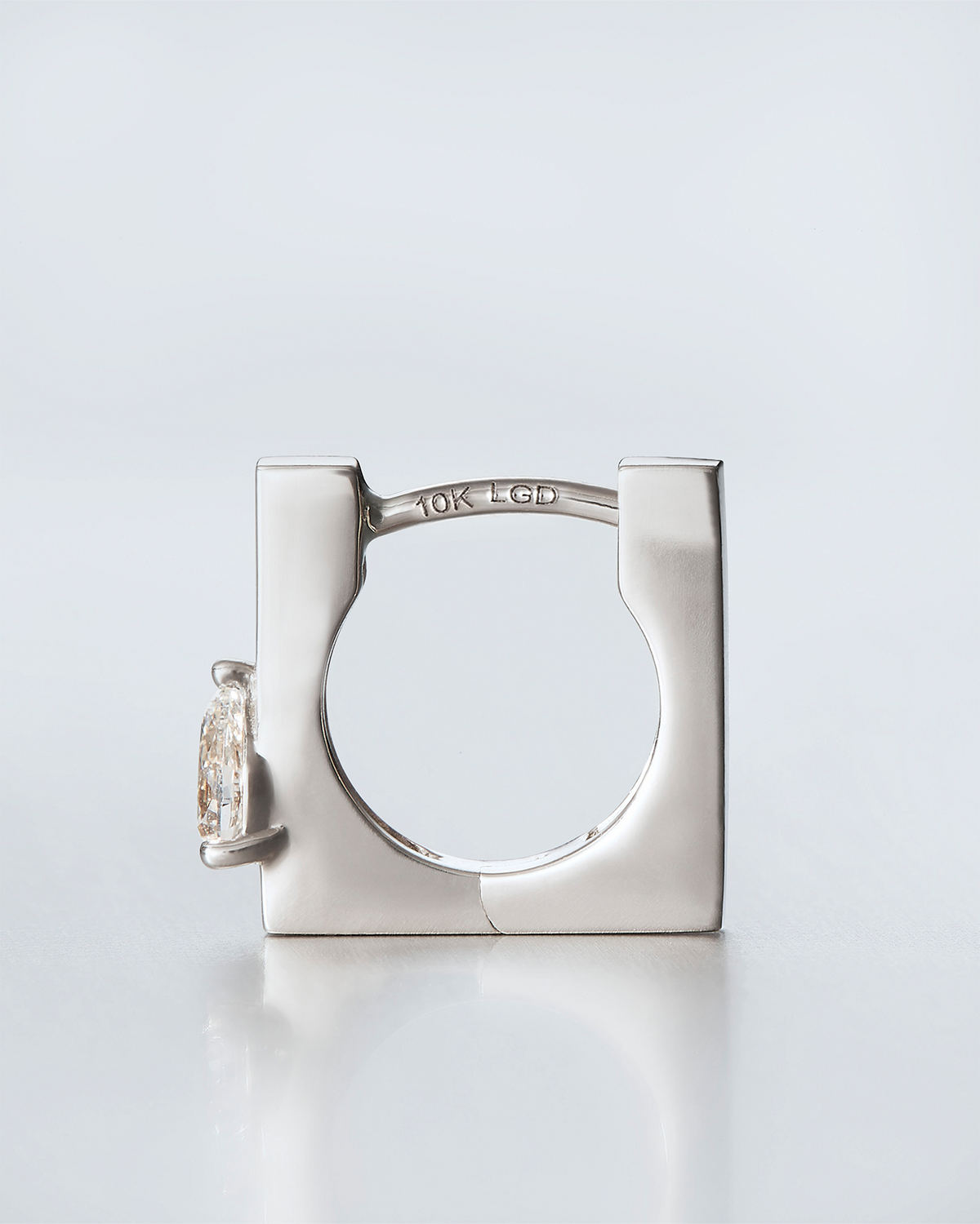 10K Pear Cut Diamond Huggie Earrings